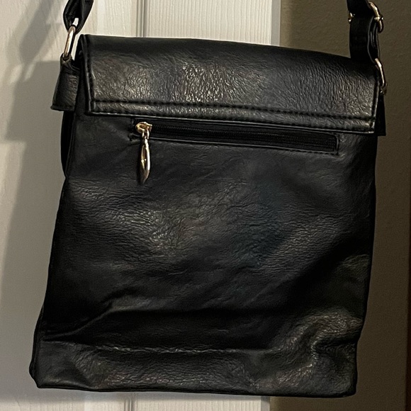 Black Crossbody Purse with Gold colored accents. - Picture 5 of 10